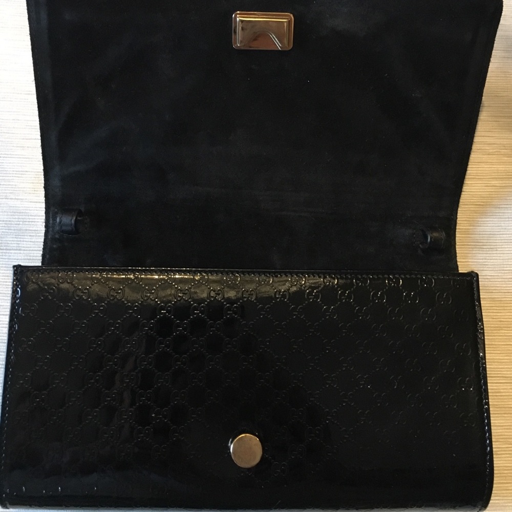 GUCCI clutch GG Monogram. Excellent Condition.